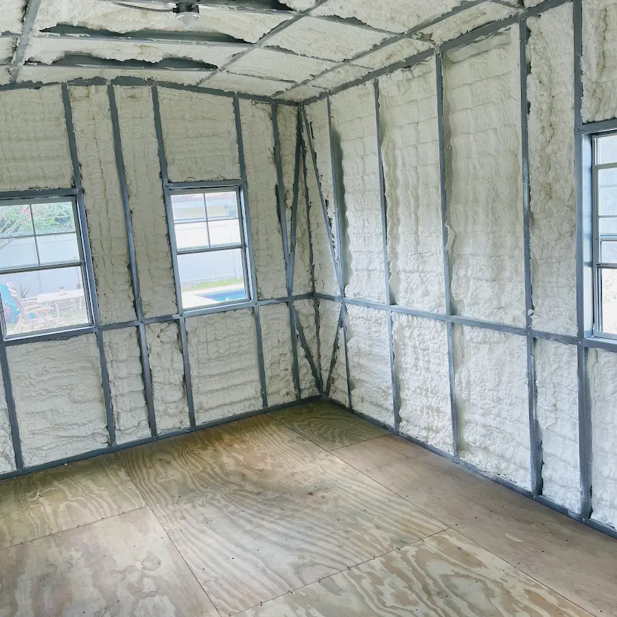 Closed-cell spray foam insulation applied to wall cavities in a residential project in Westwego